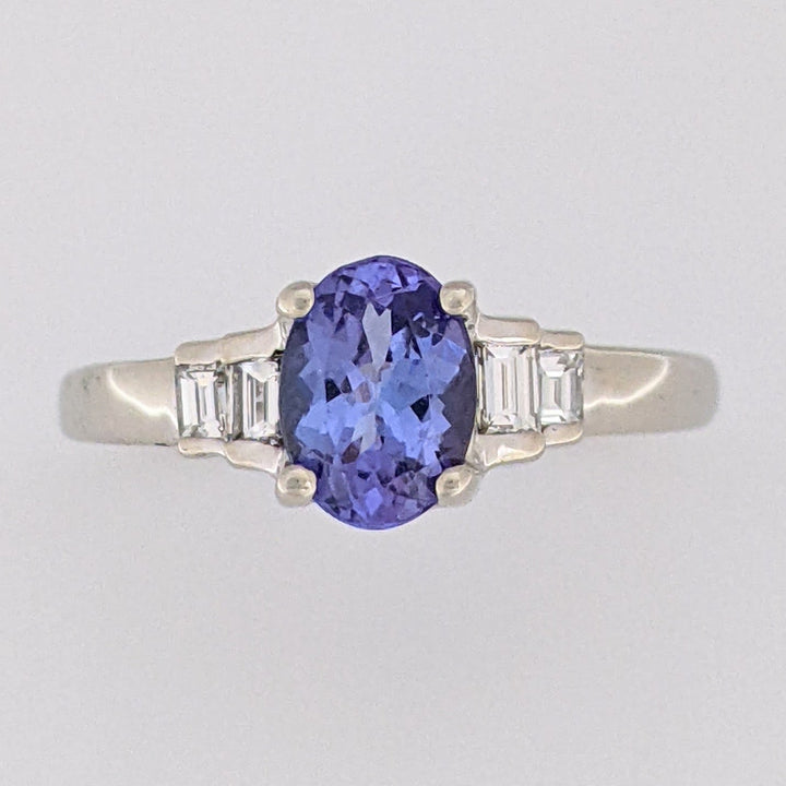 14K WHITE TANZANITE OVAL 5X7 WITH .18 DIAMOND TOTAL WEIGHT (4) EMERALD CUT ESTATE RING 2.2 GRAMS