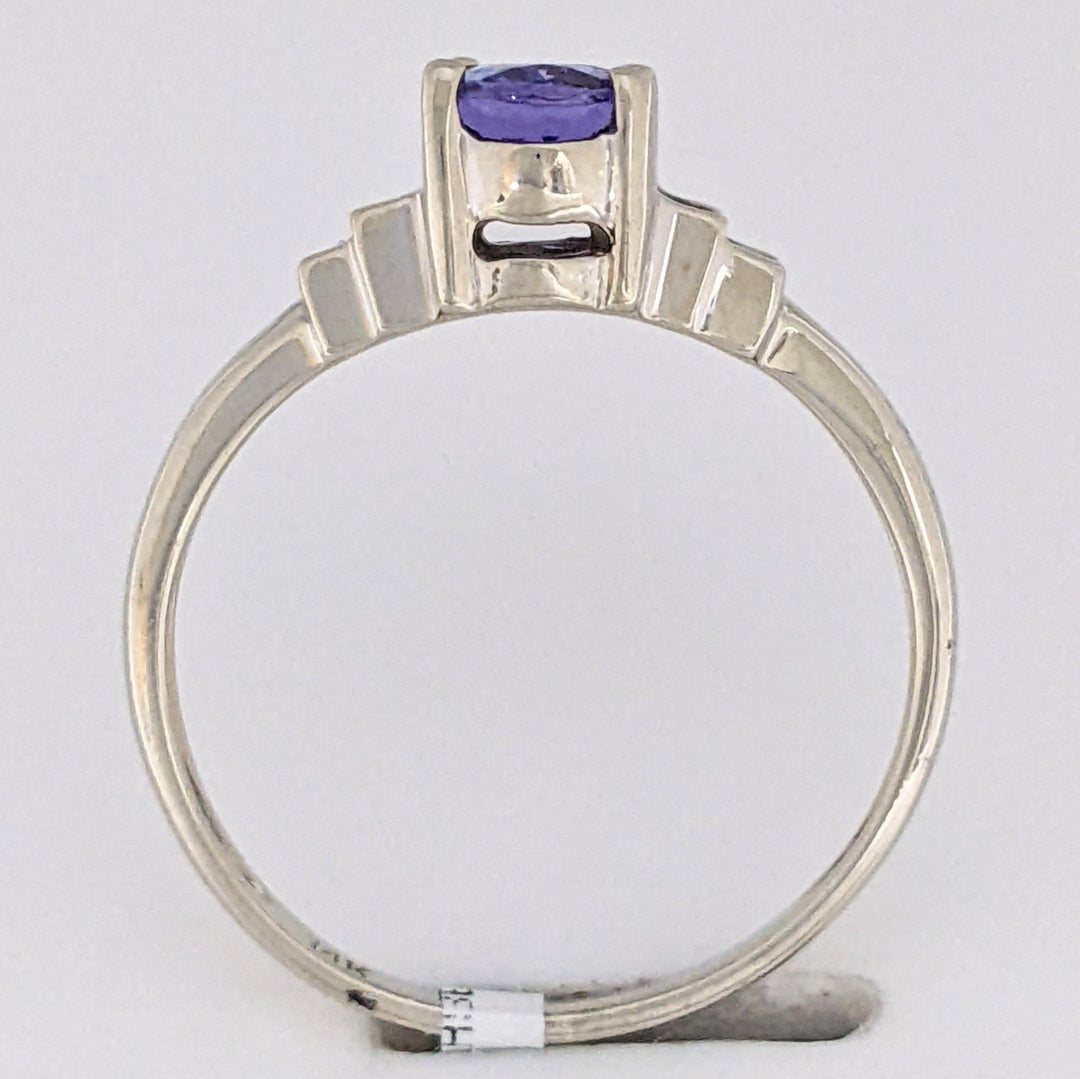 14K WHITE TANZANITE OVAL 5X7 WITH .18 DIAMOND TOTAL WEIGHT (4) EMERALD CUT ESTATE RING 2.2 GRAMS