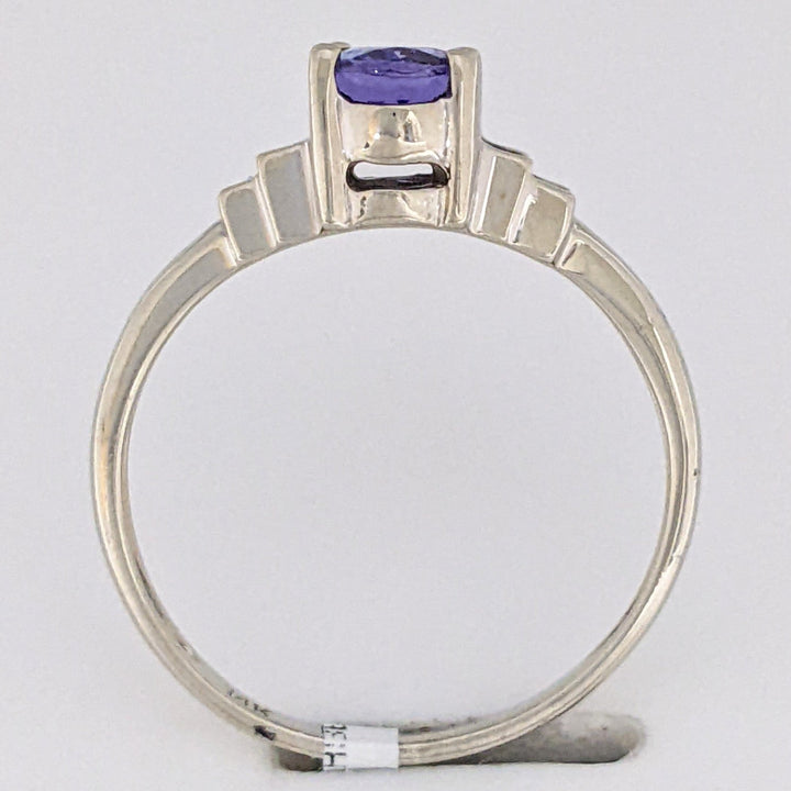 14K WHITE TANZANITE OVAL 5X7 WITH .18 DIAMOND TOTAL WEIGHT (4) EMERALD CUT ESTATE RING 2.2 GRAMS