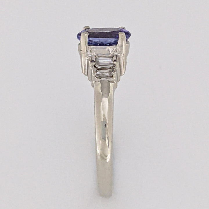 14K WHITE TANZANITE OVAL 5X7 WITH .18 DIAMOND TOTAL WEIGHT (4) EMERALD CUT ESTATE RING 2.2 GRAMS