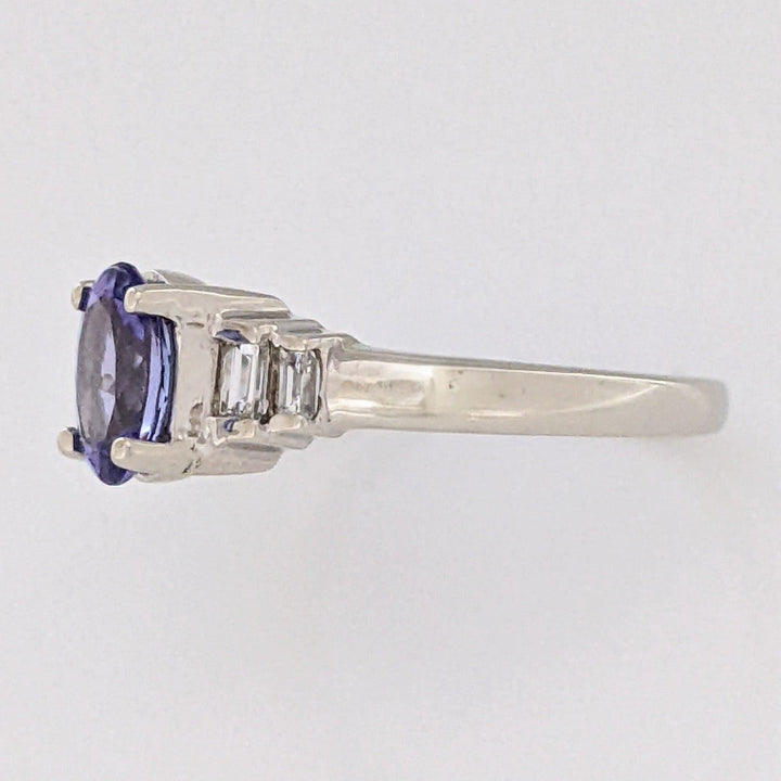 14K WHITE TANZANITE OVAL 5X7 WITH .18 DIAMOND TOTAL WEIGHT (4) EMERALD CUT ESTATE RING 2.2 GRAMS
