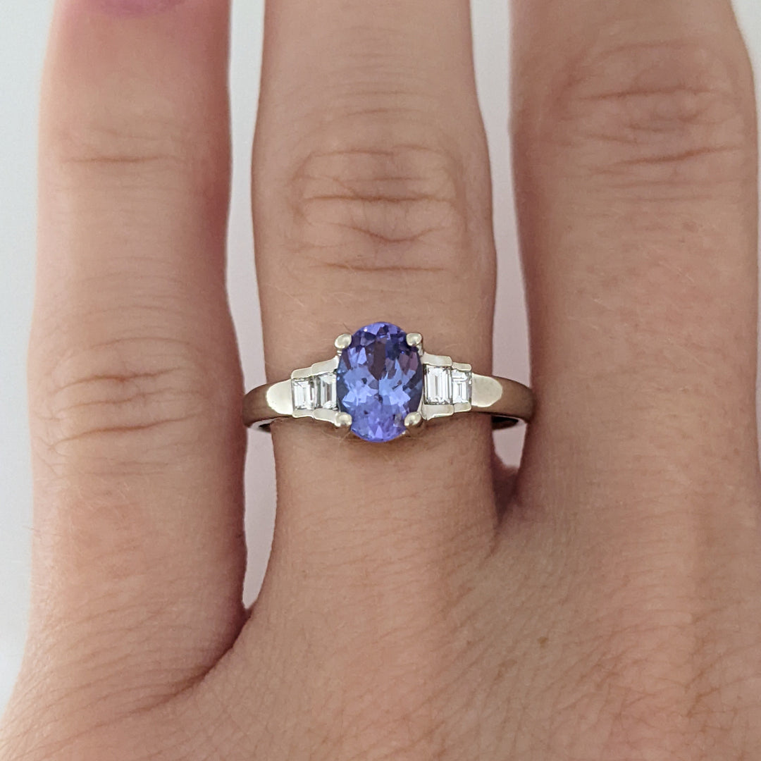 14K WHITE TANZANITE OVAL 5X7 WITH .18 DIAMOND TOTAL WEIGHT (4) EMERALD CUT ESTATE RING 2.2 GRAMS