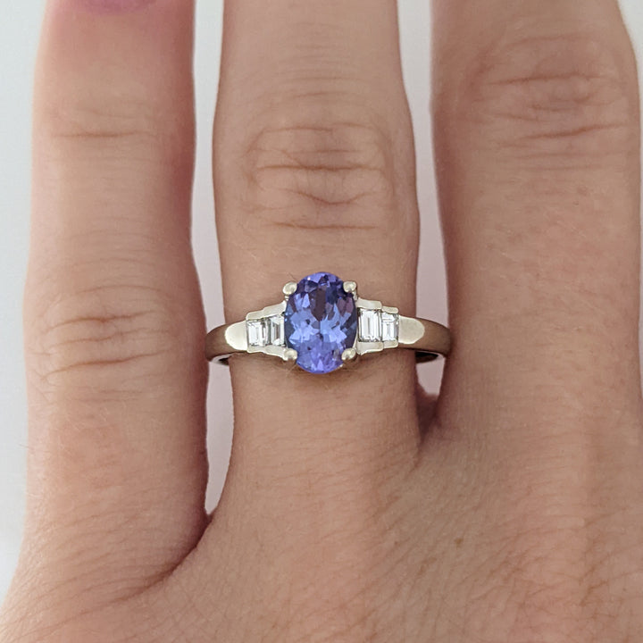 14K WHITE TANZANITE OVAL 5X7 WITH .18 DIAMOND TOTAL WEIGHT (4) EMERALD CUT ESTATE RING 2.2 GRAMS