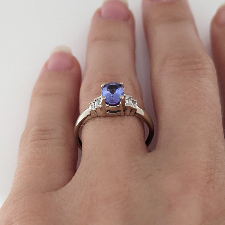 14K WHITE TANZANITE OVAL 5X7 WITH .18 DIAMOND TOTAL WEIGHT (4) EMERALD CUT ESTATE RING 2.2 GRAMS