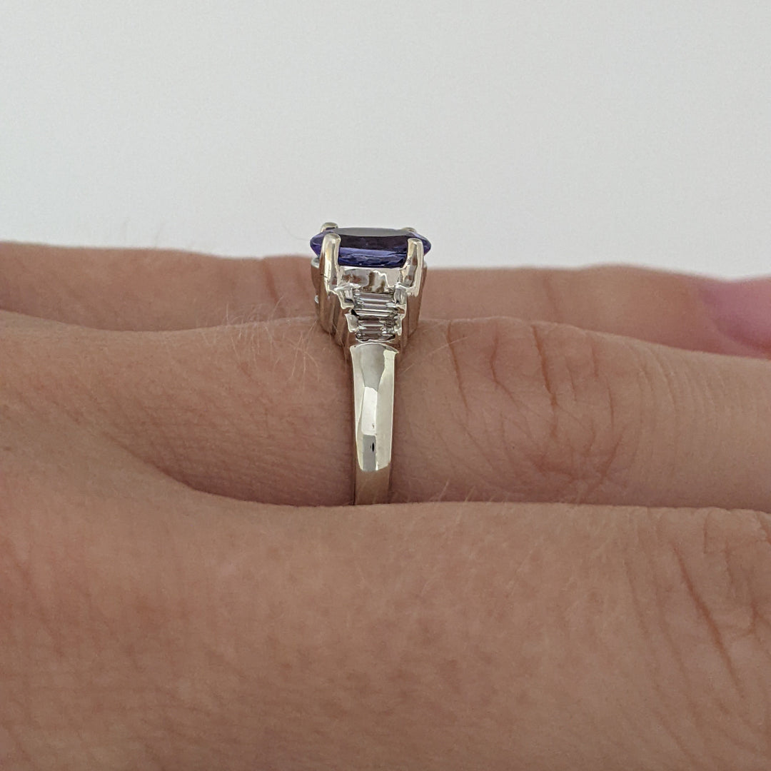 14K WHITE TANZANITE OVAL 5X7 WITH .18 DIAMOND TOTAL WEIGHT (4) EMERALD CUT ESTATE RING 2.2 GRAMS