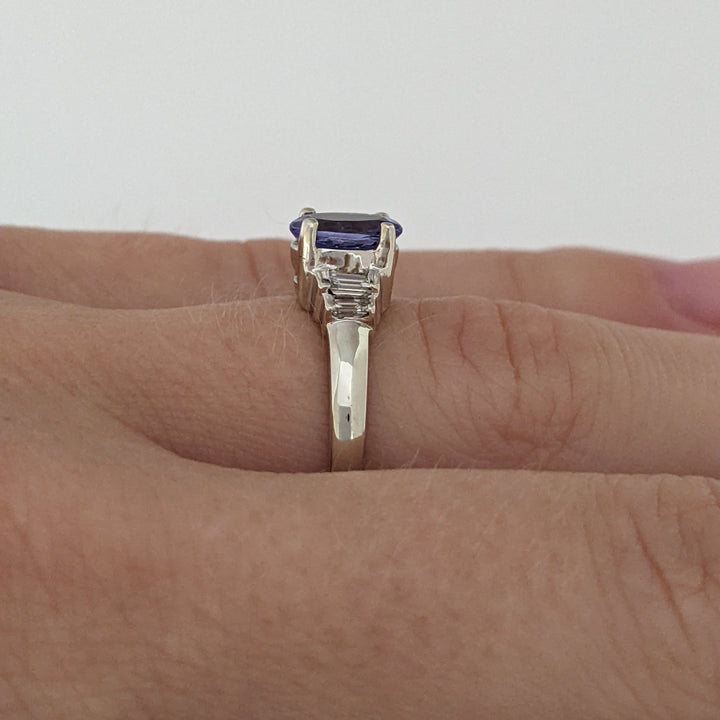 14K WHITE TANZANITE OVAL 5X7 WITH .18 DIAMOND TOTAL WEIGHT (4) EMERALD CUT ESTATE RING 2.2 GRAMS