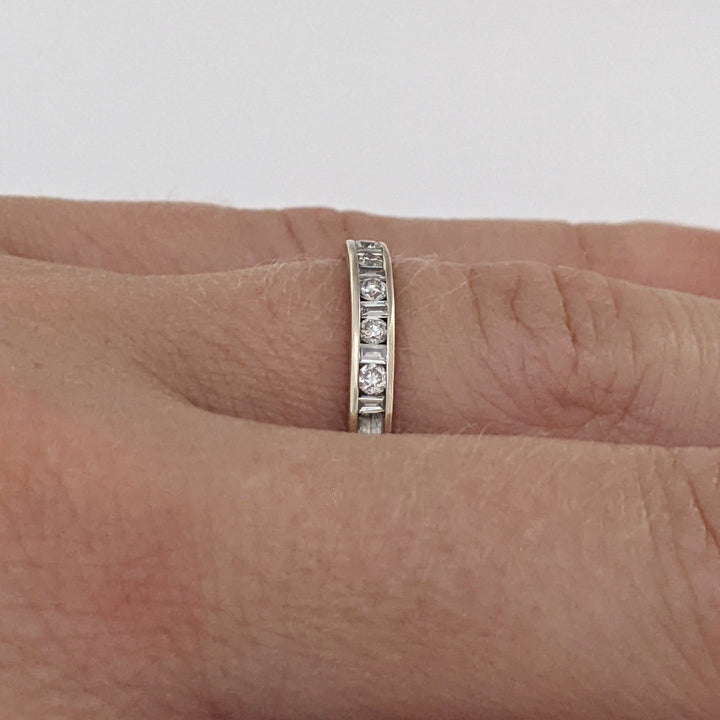 14K WHITE .22 CARAT TOTAL WEIGHT I1 H DIAMOND ROUND (7) BAGUETTE (8) ESTATE CHANNEL BAND 1.7 GRAMS