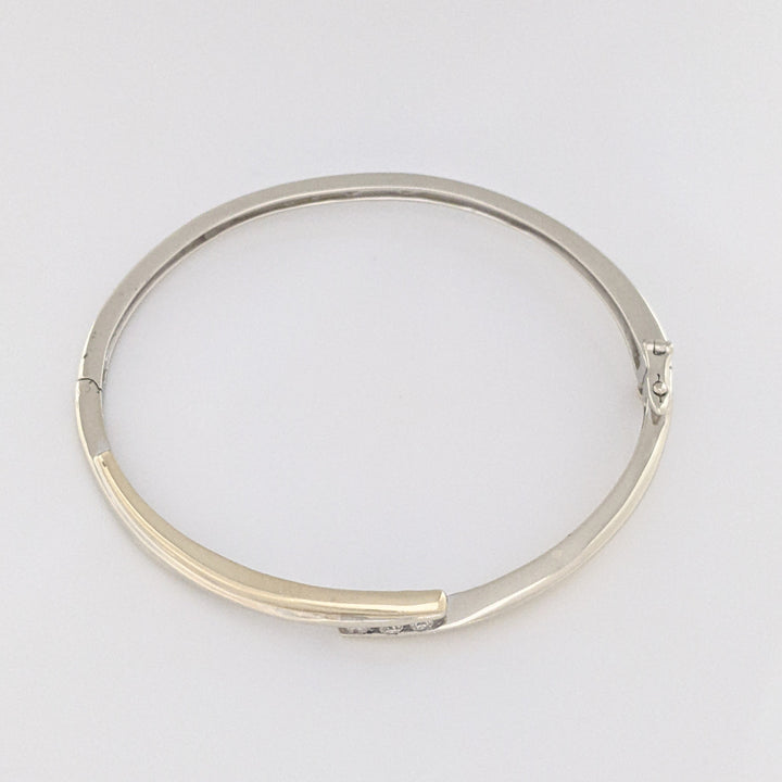 10K TWO-TONE .15 CARAT TOTAL WEIGHT SI2 K DIAMOND ROUND (3) BYPASS ESTATE BANGLE 14.5 GRAMS