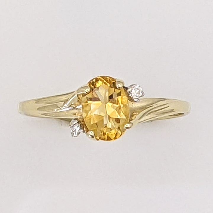 10K CITRINE OVAL 5X7 WITH (2) MELEE ESTATE RING 1.3 GRAMS