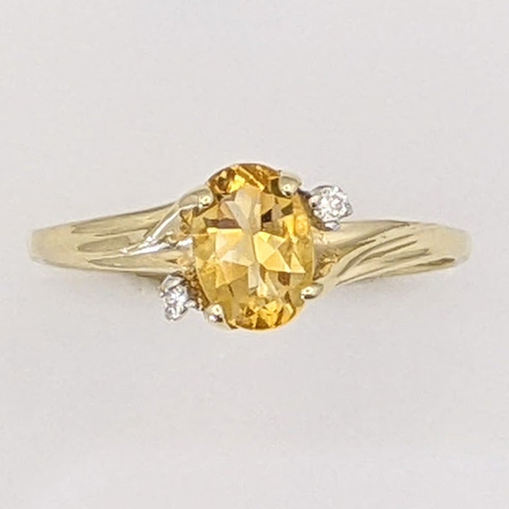 10K CITRINE OVAL 5X7 WITH (2) MELEE ESTATE RING 1.3 GRAMS