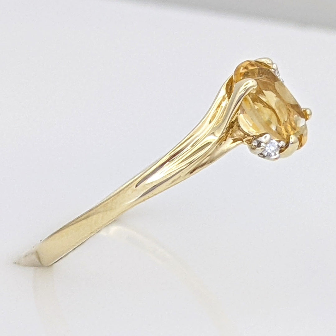 10K CITRINE OVAL 5X7 WITH (2) MELEE ESTATE RING 1.3 GRAMS