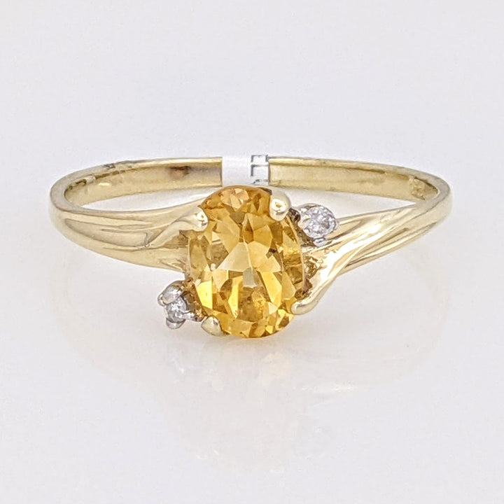 10K CITRINE OVAL 5X7 WITH (2) MELEE ESTATE RING 1.3 GRAMS