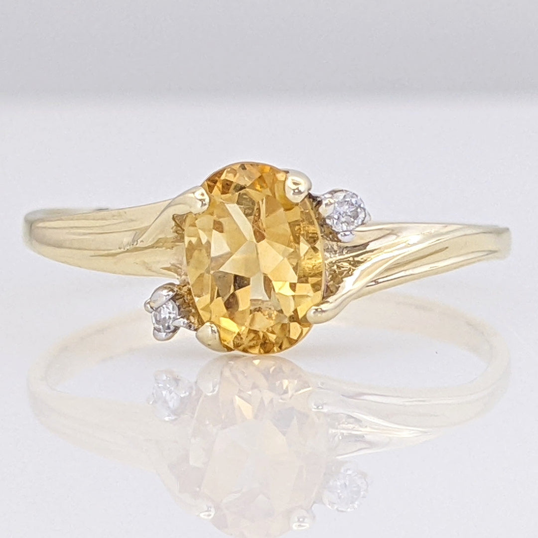 10K CITRINE OVAL 5X7 WITH (2) MELEE ESTATE RING 1.3 GRAMS