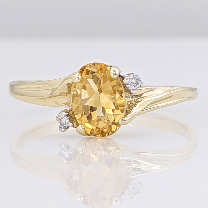 10K CITRINE OVAL 5X7 WITH (2) MELEE ESTATE RING 1.3 GRAMS