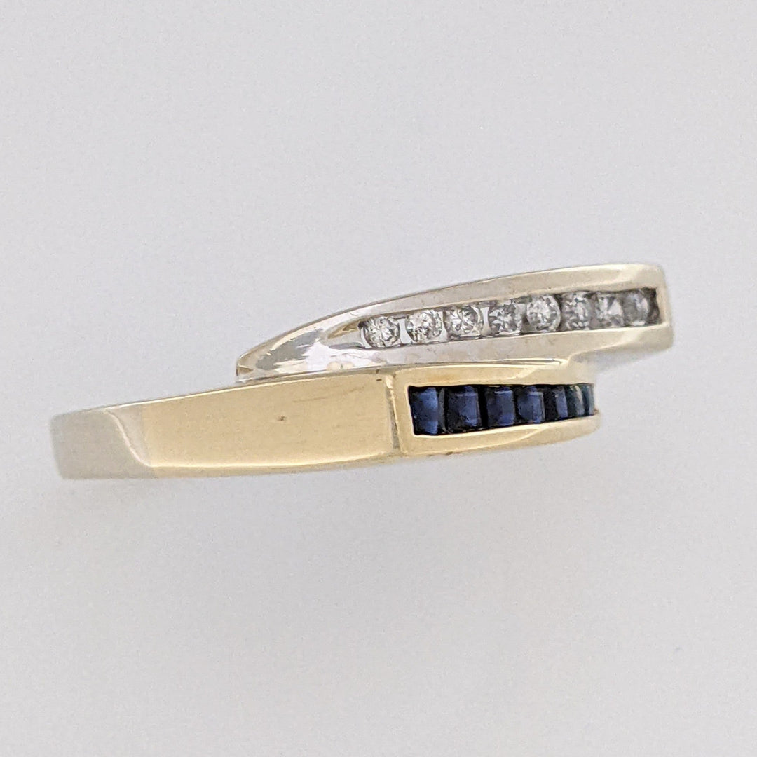 14K TWO-TONE .16 CARAT TOTAL WEIGHT I1 I DIAMOND ROUND (8) SAPPHIRE PRINCESS CUT (8) ESTATE CHANNEL BYPASS RING 4.0 GRAMS