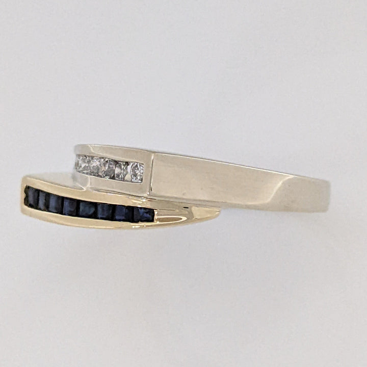 14K TWO-TONE .16 CARAT TOTAL WEIGHT I1 I DIAMOND ROUND (8) SAPPHIRE PRINCESS CUT (8) ESTATE CHANNEL BYPASS RING 4.0 GRAMS