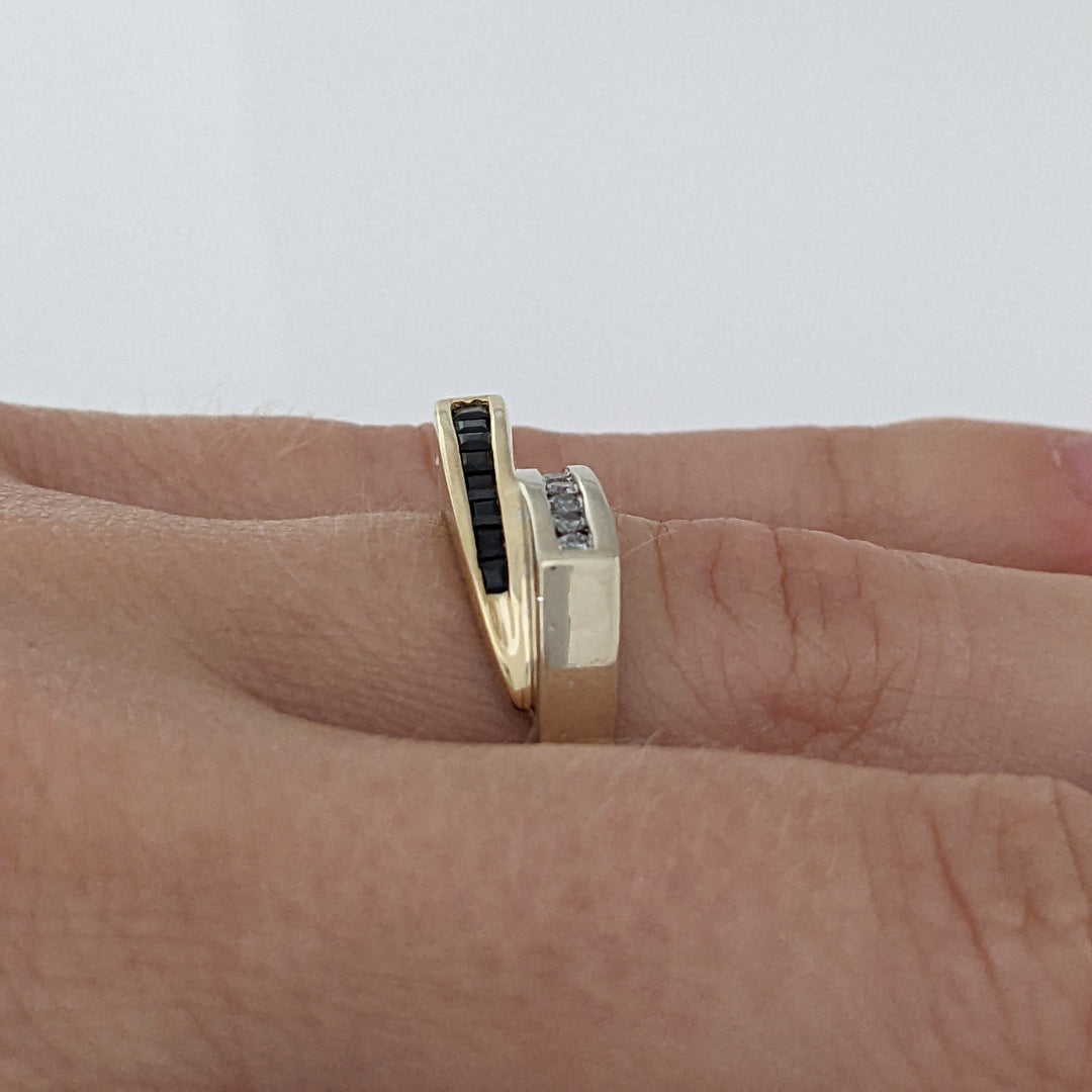 14K TWO-TONE .16 CARAT TOTAL WEIGHT I1 I DIAMOND ROUND (8) SAPPHIRE PRINCESS CUT (8) ESTATE CHANNEL BYPASS RING 4.0 GRAMS
