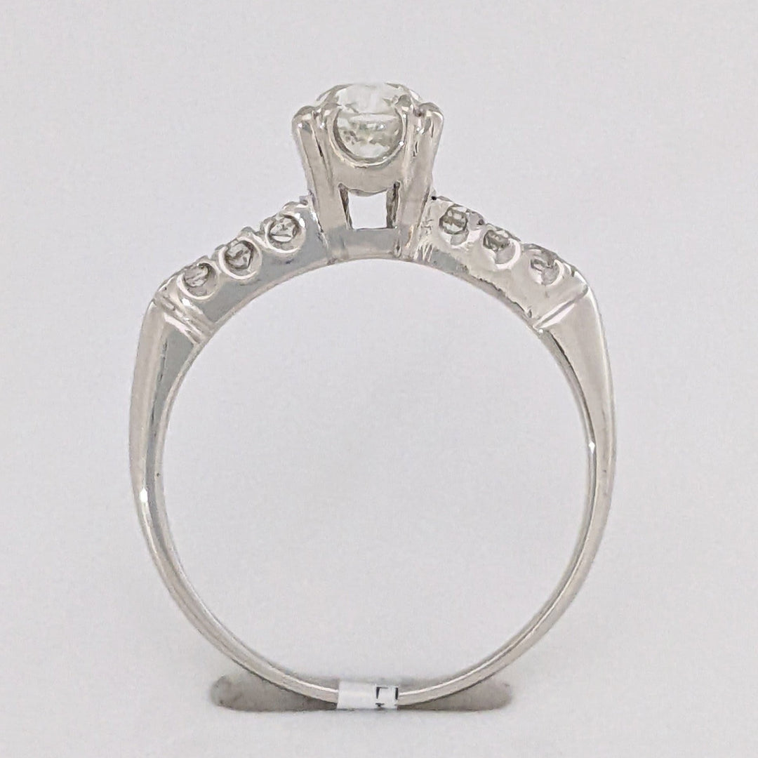 PLATINUM .72 CARAT TOTAL VS2 J DIAMOND ROUND WITH .12 DIAMOND TOTAL WEIGHT ESTATE RING 3.9 GRAMS