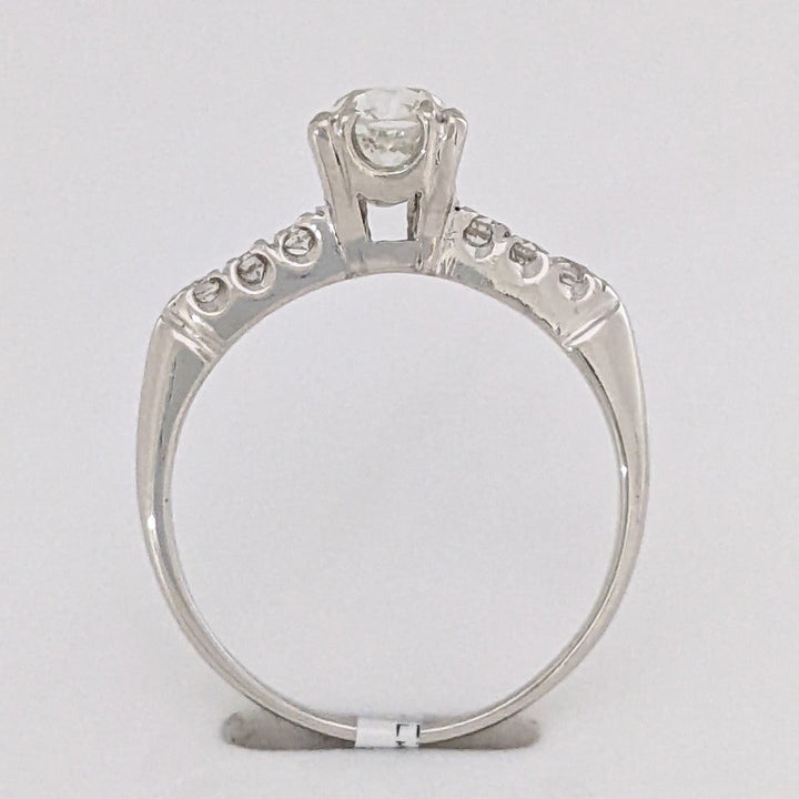 PLATINUM .72 CARAT TOTAL VS2 J DIAMOND ROUND WITH .12 DIAMOND TOTAL WEIGHT ESTATE RING 3.9 GRAMS