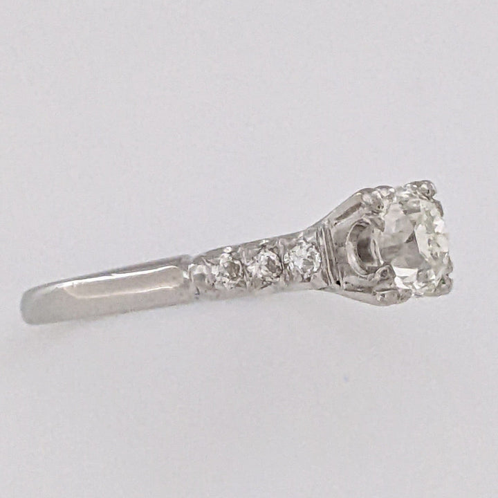 PLATINUM .72 CARAT TOTAL VS2 J DIAMOND ROUND WITH .12 DIAMOND TOTAL WEIGHT ESTATE RING 3.9 GRAMS