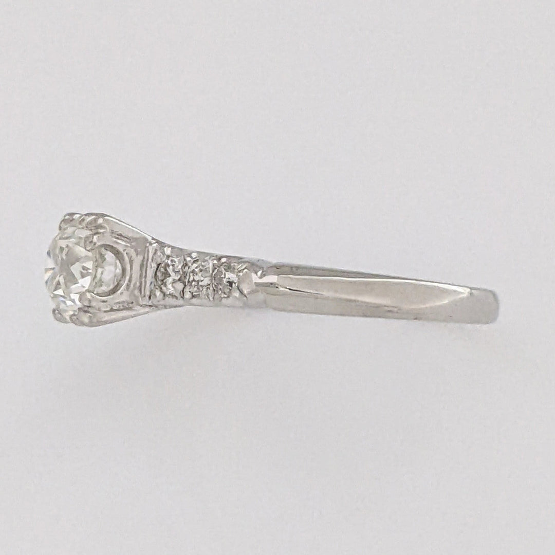 PLATINUM .72 CARAT TOTAL VS2 J DIAMOND ROUND WITH .12 DIAMOND TOTAL WEIGHT ESTATE RING 3.9 GRAMS