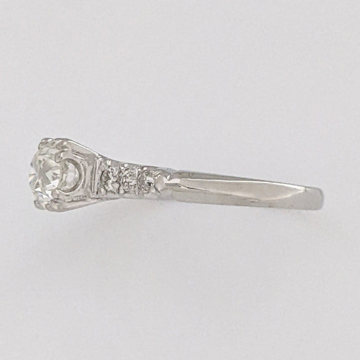 PLATINUM .72 CARAT TOTAL VS2 J DIAMOND ROUND WITH .12 DIAMOND TOTAL WEIGHT ESTATE RING 3.9 GRAMS
