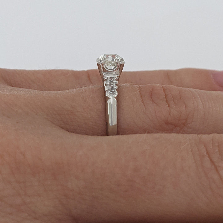 PLATINUM .72 CARAT TOTAL VS2 J DIAMOND ROUND WITH .12 DIAMOND TOTAL WEIGHT ESTATE RING 3.9 GRAMS