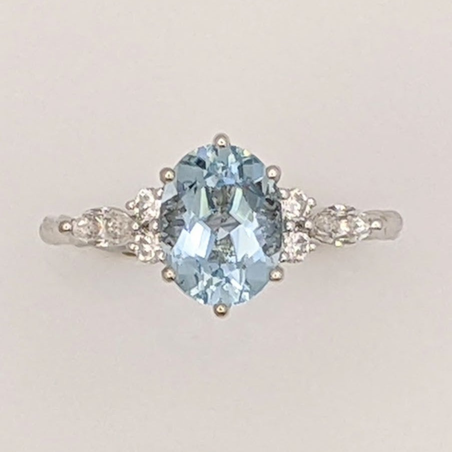 14K WHITE AQUAMARINE OVAL 6X9 WITH .24 DIAMOND TOTAL WEIGHT MARQUISE (2) ROUND (4) ESTATE RING 2.0 GRAMS