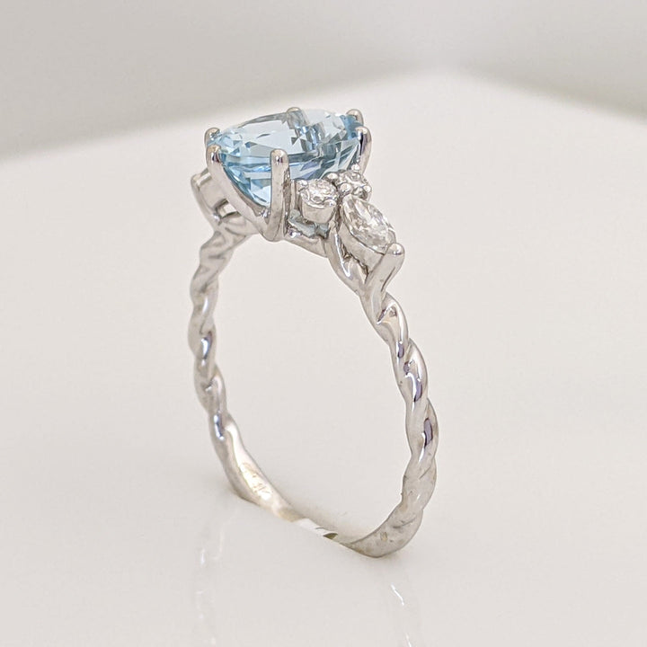 14K WHITE AQUAMARINE OVAL 6X9 WITH .24 DIAMOND TOTAL WEIGHT MARQUISE (2) ROUND (4) ESTATE RING 2.0 GRAMS