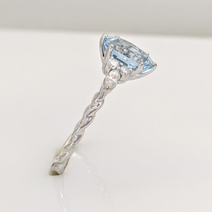 14K WHITE AQUAMARINE OVAL 6X9 WITH .24 DIAMOND TOTAL WEIGHT MARQUISE (2) ROUND (4) ESTATE RING 2.0 GRAMS