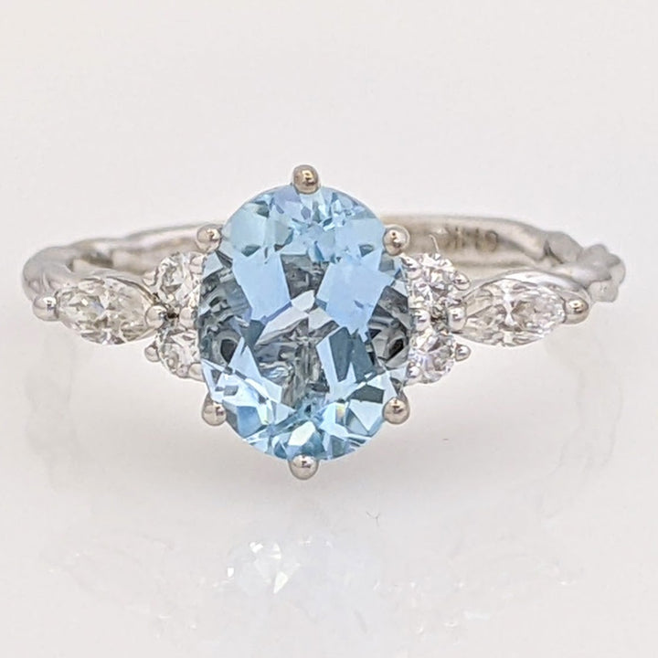 14K WHITE AQUAMARINE OVAL 6X9 WITH .24 DIAMOND TOTAL WEIGHT MARQUISE (2) ROUND (4) ESTATE RING 2.0 GRAMS