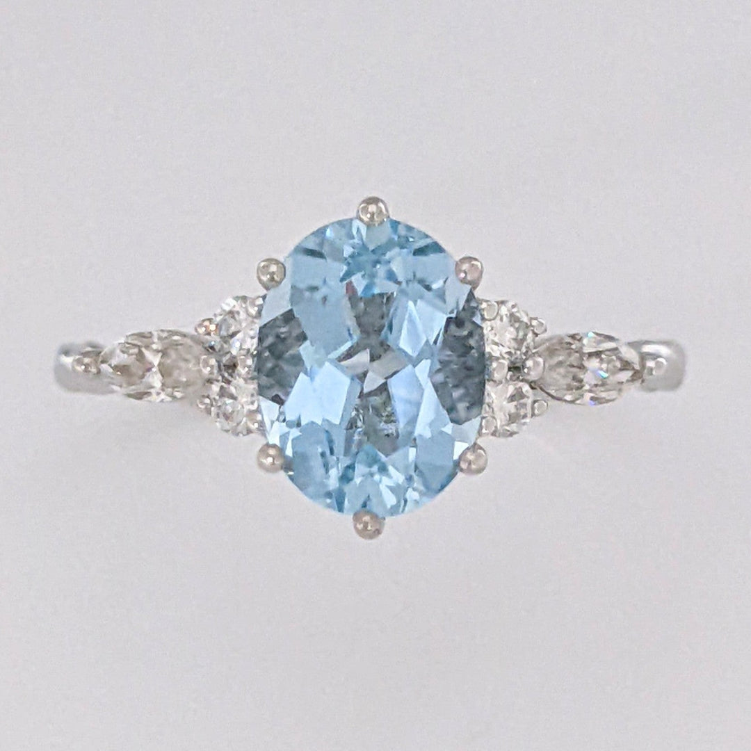 14K WHITE AQUAMARINE OVAL 6X9 WITH .24 DIAMOND TOTAL WEIGHT MARQUISE (2) ROUND (4) ESTATE RING 2.0 GRAMS