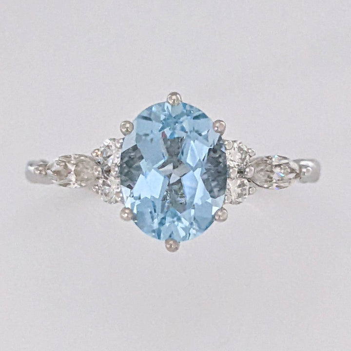 14K WHITE AQUAMARINE OVAL 6X9 WITH .24 DIAMOND TOTAL WEIGHT MARQUISE (2) ROUND (4) ESTATE RING 2.0 GRAMS