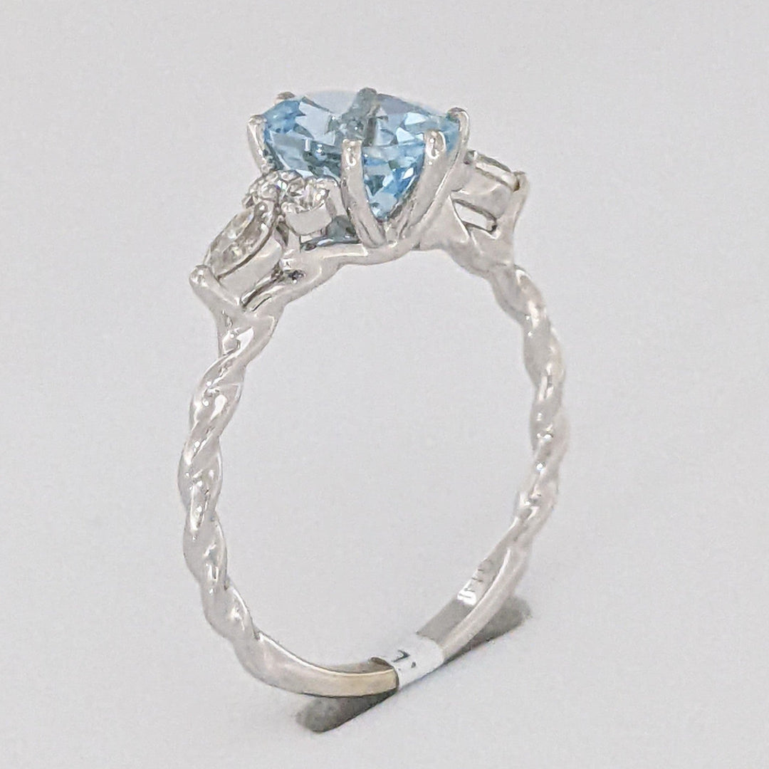 14K WHITE AQUAMARINE OVAL 6X9 WITH .24 DIAMOND TOTAL WEIGHT MARQUISE (2) ROUND (4) ESTATE RING 2.0 GRAMS