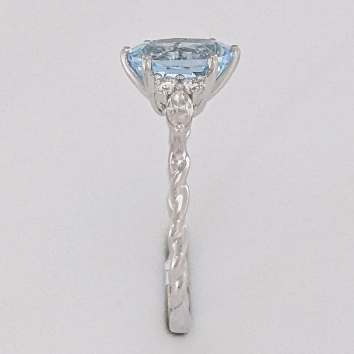14K WHITE AQUAMARINE OVAL 6X9 WITH .24 DIAMOND TOTAL WEIGHT MARQUISE (2) ROUND (4) ESTATE RING 2.0 GRAMS