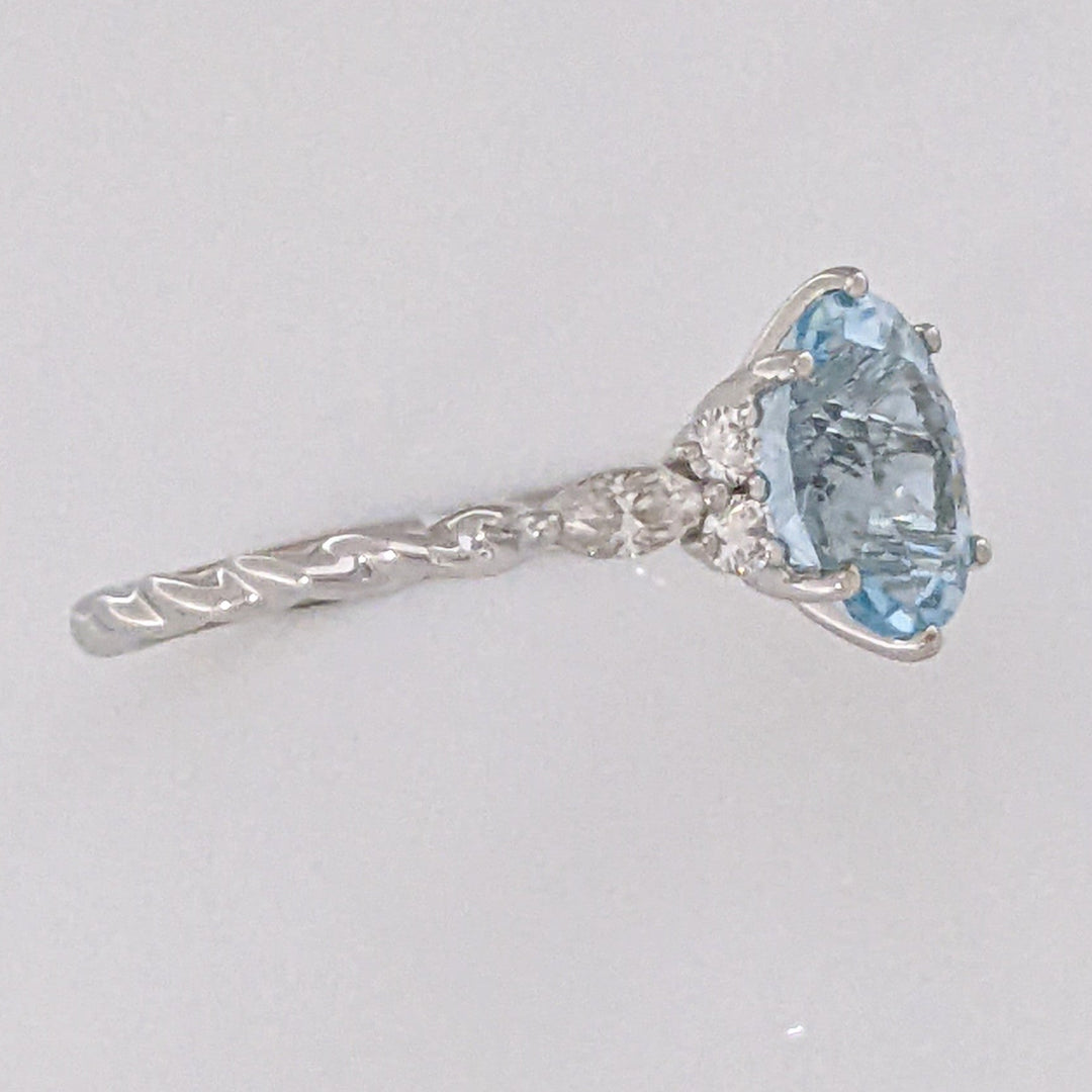 14K WHITE AQUAMARINE OVAL 6X9 WITH .24 DIAMOND TOTAL WEIGHT MARQUISE (2) ROUND (4) ESTATE RING 2.0 GRAMS