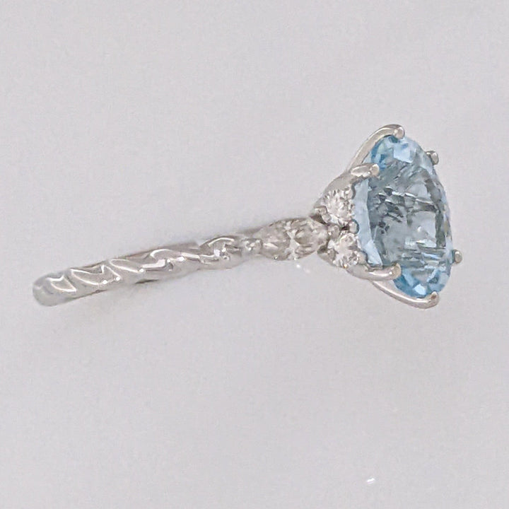 14K WHITE AQUAMARINE OVAL 6X9 WITH .24 DIAMOND TOTAL WEIGHT MARQUISE (2) ROUND (4) ESTATE RING 2.0 GRAMS