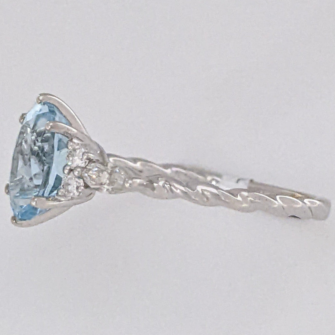 14K WHITE AQUAMARINE OVAL 6X9 WITH .24 DIAMOND TOTAL WEIGHT MARQUISE (2) ROUND (4) ESTATE RING 2.0 GRAMS