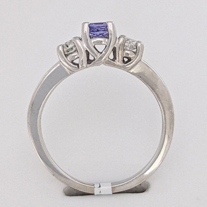 14K WHITE TANZANITE ROUND 3.8MM WITH .18 DIAMOND TOTAL WEIGHT (2) ROUND ESTATE TRINITY RING 2.9 GRAMS