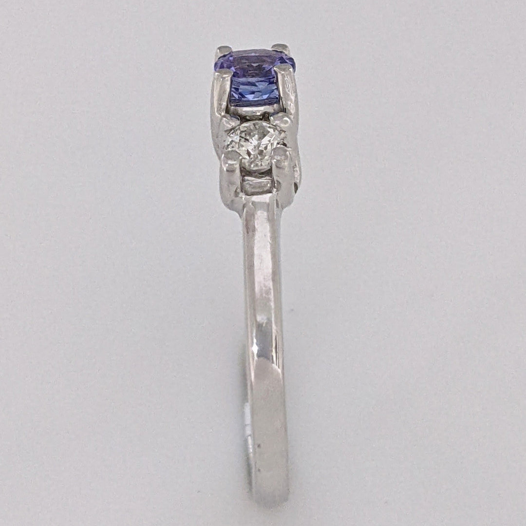 14K WHITE TANZANITE ROUND 3.8MM WITH .18 DIAMOND TOTAL WEIGHT (2) ROUND ESTATE TRINITY RING 2.9 GRAMS