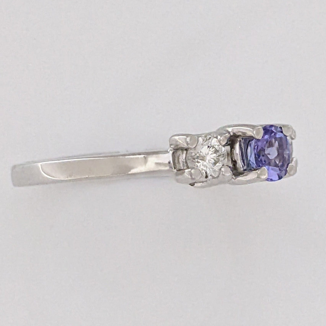 14K WHITE TANZANITE ROUND 3.8MM WITH .18 DIAMOND TOTAL WEIGHT (2) ROUND ESTATE TRINITY RING 2.9 GRAMS