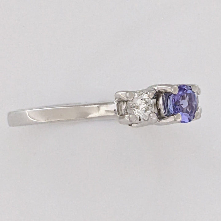 14K WHITE TANZANITE ROUND 3.8MM WITH .18 DIAMOND TOTAL WEIGHT (2) ROUND ESTATE TRINITY RING 2.9 GRAMS