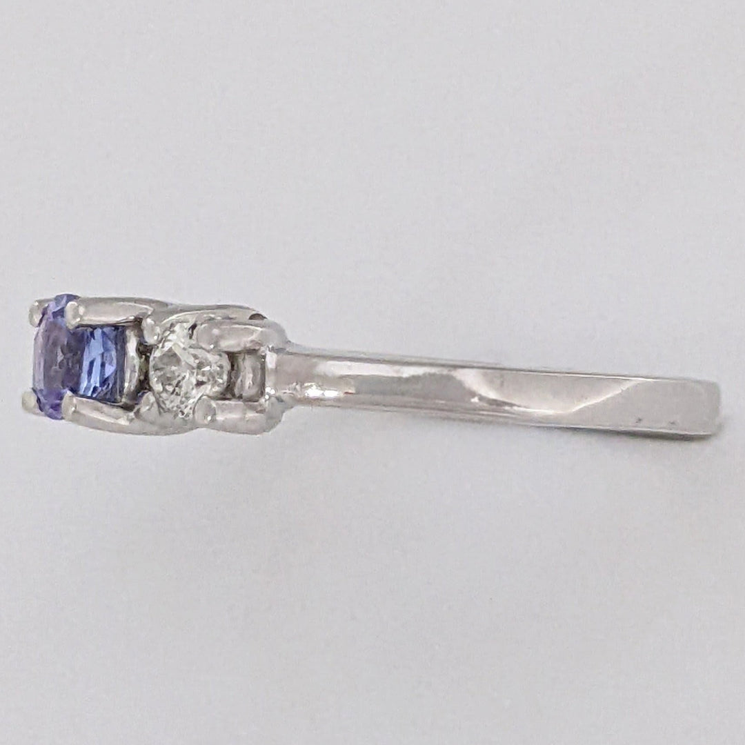 14K WHITE TANZANITE ROUND 3.8MM WITH .18 DIAMOND TOTAL WEIGHT (2) ROUND ESTATE TRINITY RING 2.9 GRAMS