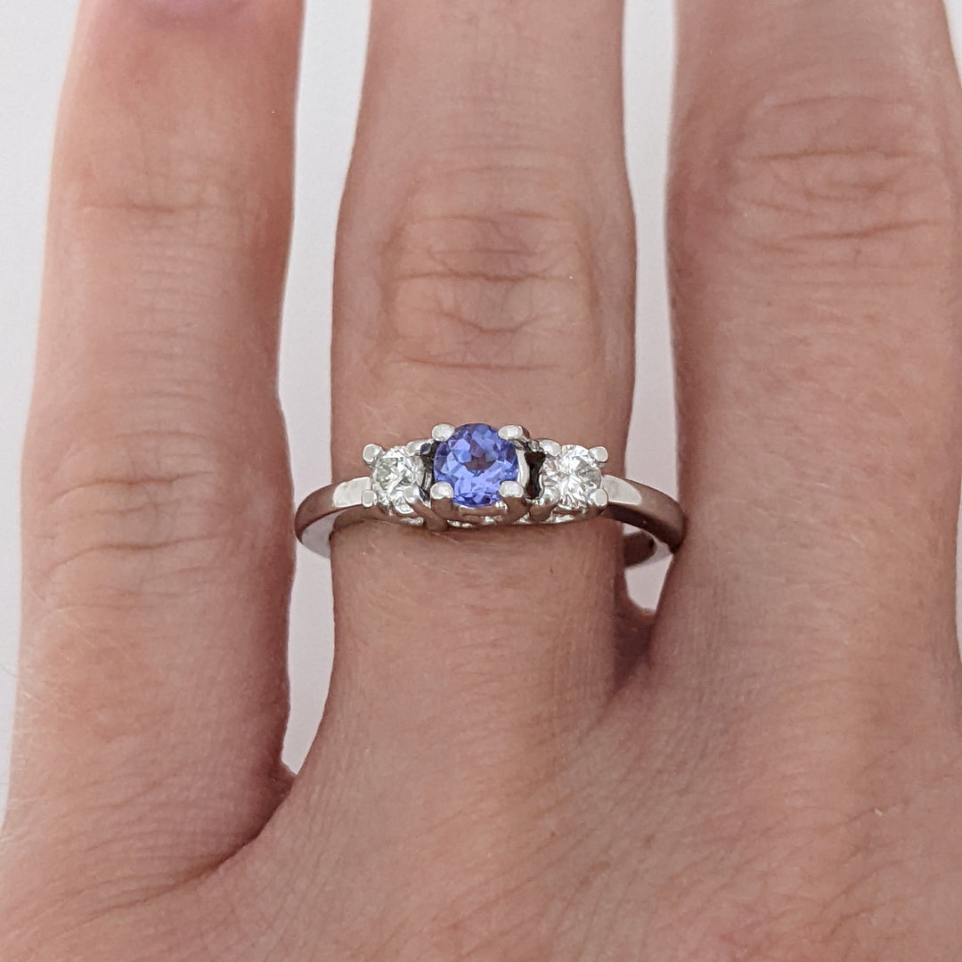 14K WHITE TANZANITE ROUND 3.8MM WITH .18 DIAMOND TOTAL WEIGHT (2) ROUND ESTATE TRINITY RING 2.9 GRAMS