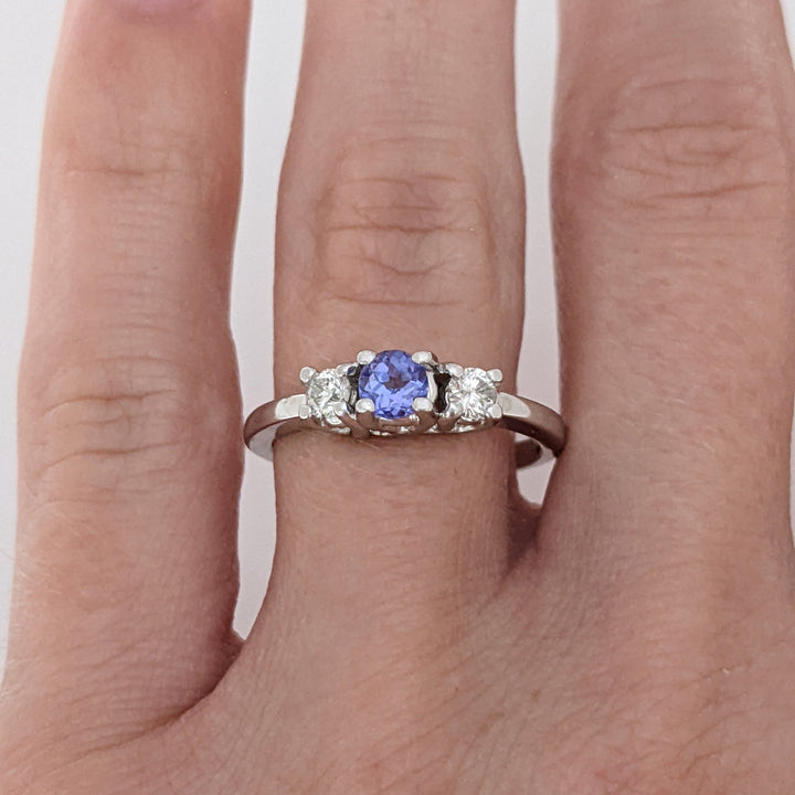 14K WHITE TANZANITE ROUND 3.8MM WITH .18 DIAMOND TOTAL WEIGHT (2) ROUND ESTATE TRINITY RING 2.9 GRAMS