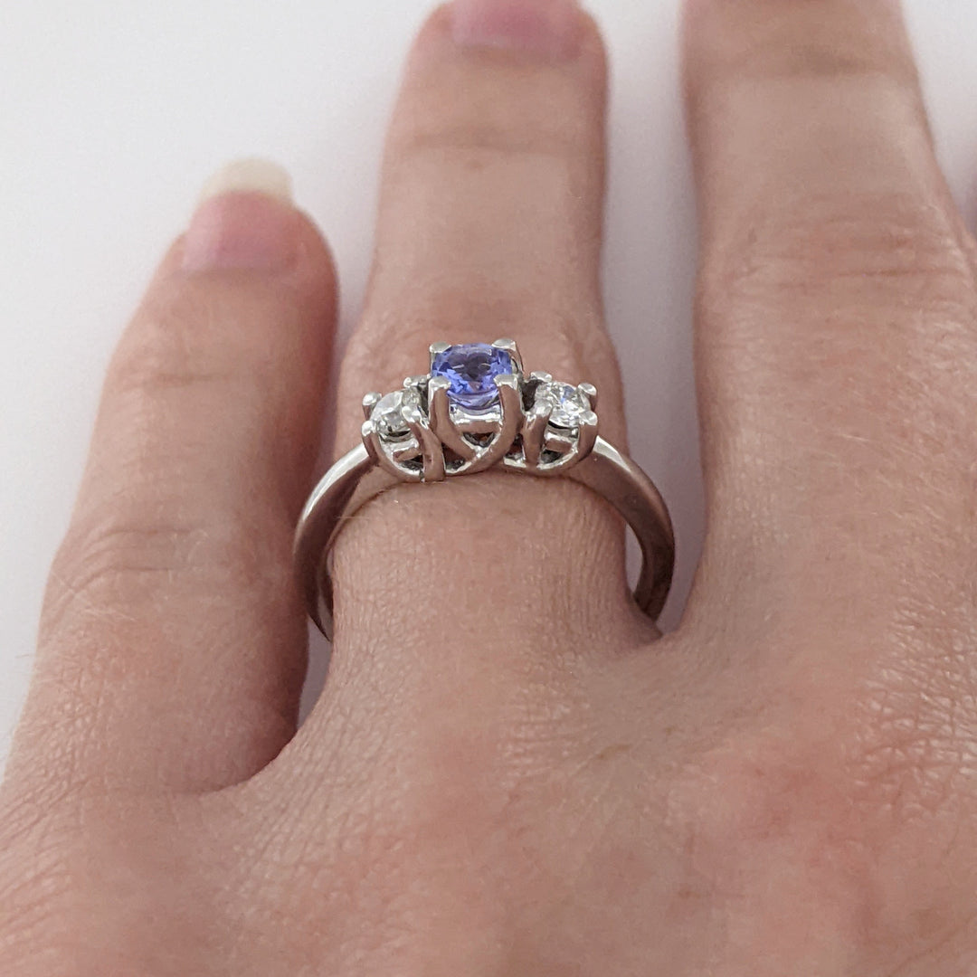 14K WHITE TANZANITE ROUND 3.8MM WITH .18 DIAMOND TOTAL WEIGHT (2) ROUND ESTATE TRINITY RING 2.9 GRAMS