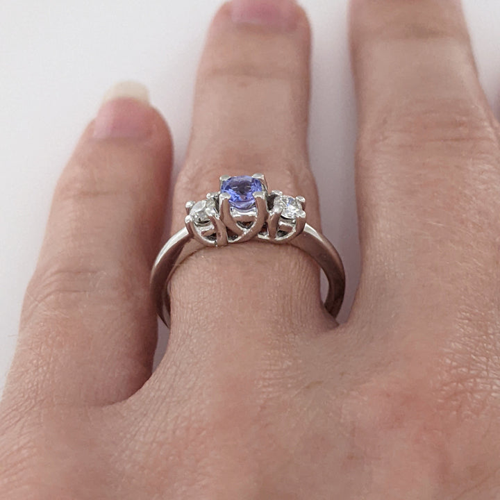 14K WHITE TANZANITE ROUND 3.8MM WITH .18 DIAMOND TOTAL WEIGHT (2) ROUND ESTATE TRINITY RING 2.9 GRAMS