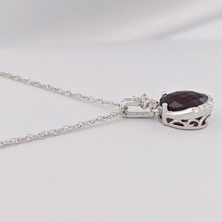 14K WHITE GARNET OVAL 1.32 CARAT TOTAL WITH .08 DIAMOND TOTAL WEIGHT ESTATE PENDANT & CHAIN 2.0 GRAMS