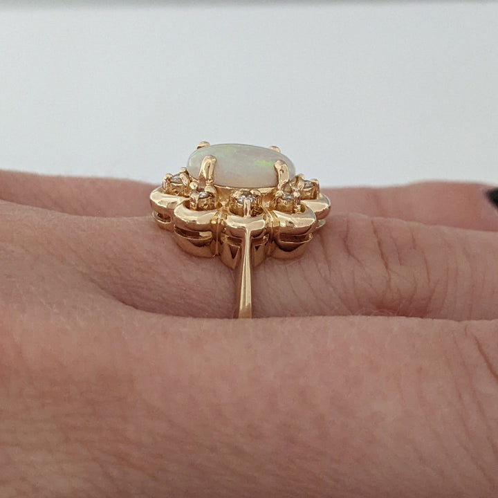 14K OPAL OVAL 7X9 WITH (8) MELEE ESTATE FLOWER RING 3.9 GRAMS