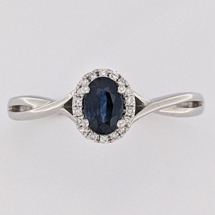 14K WHITE SAPPHIRE OVAL 4X6 WITH .15 DIAMOND TOTAL WEIGHT ESTATE HALO RING 2.7 GRAMS